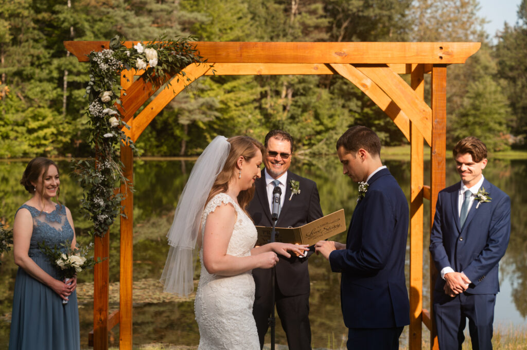 Leah & Brian exchanging rings.