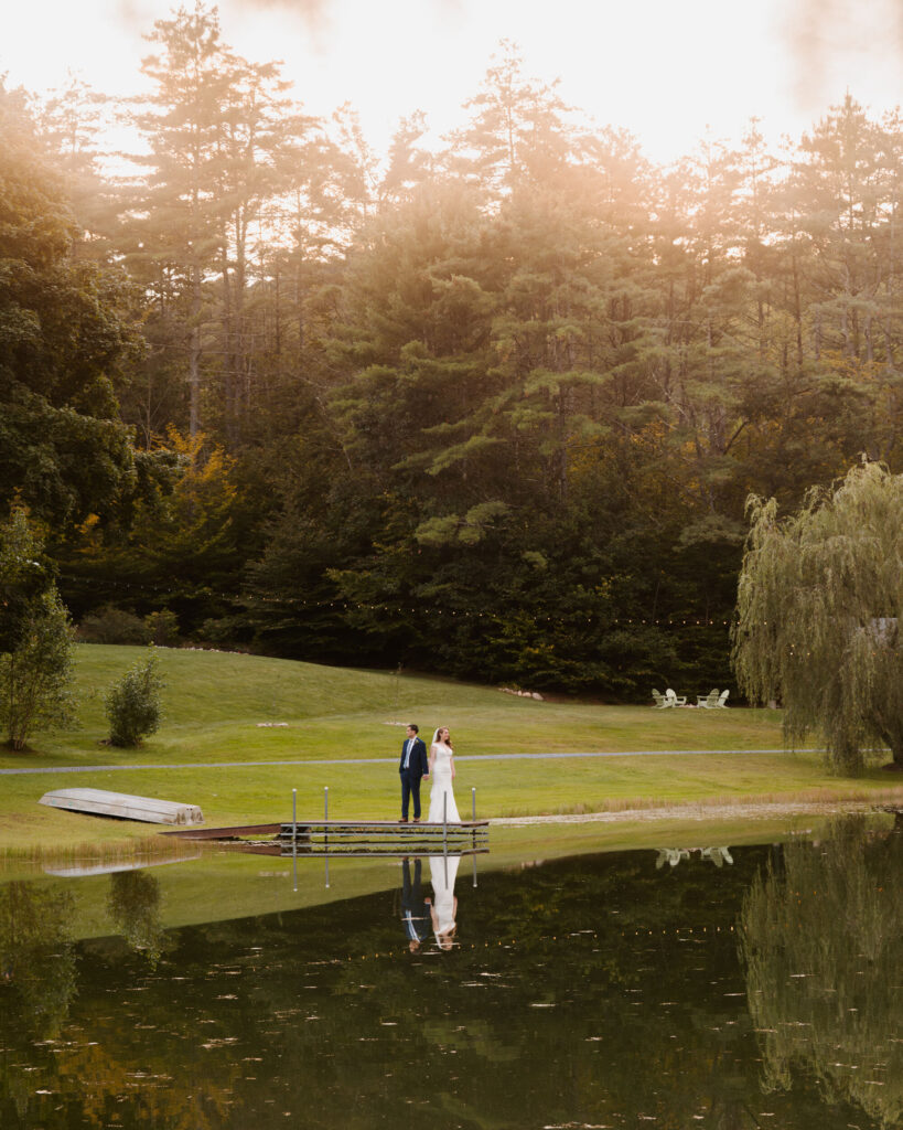 A golden hour portrait of the bride and groom at Juniper Springs Wedding Barn.