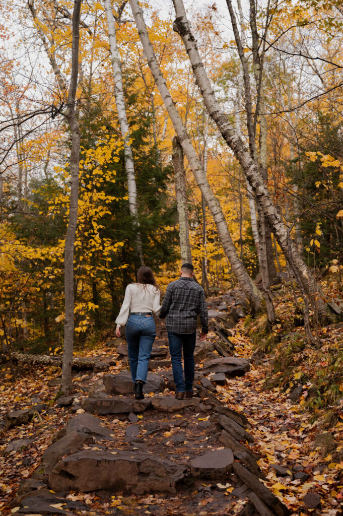 Aubrie and Dolan making their way back up the trail at Kaaterskill Falls during their engagement session in the Catskill Mountains.