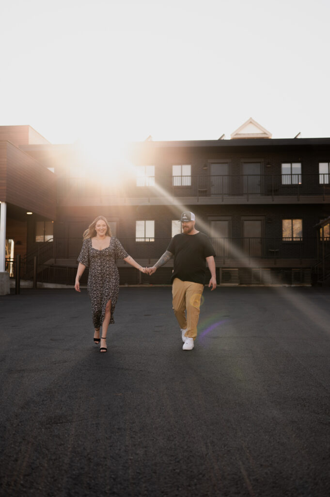 Golden hour sun shining in Saratoga Springs, NY during their engagement photos with Austin Ryan Photo.