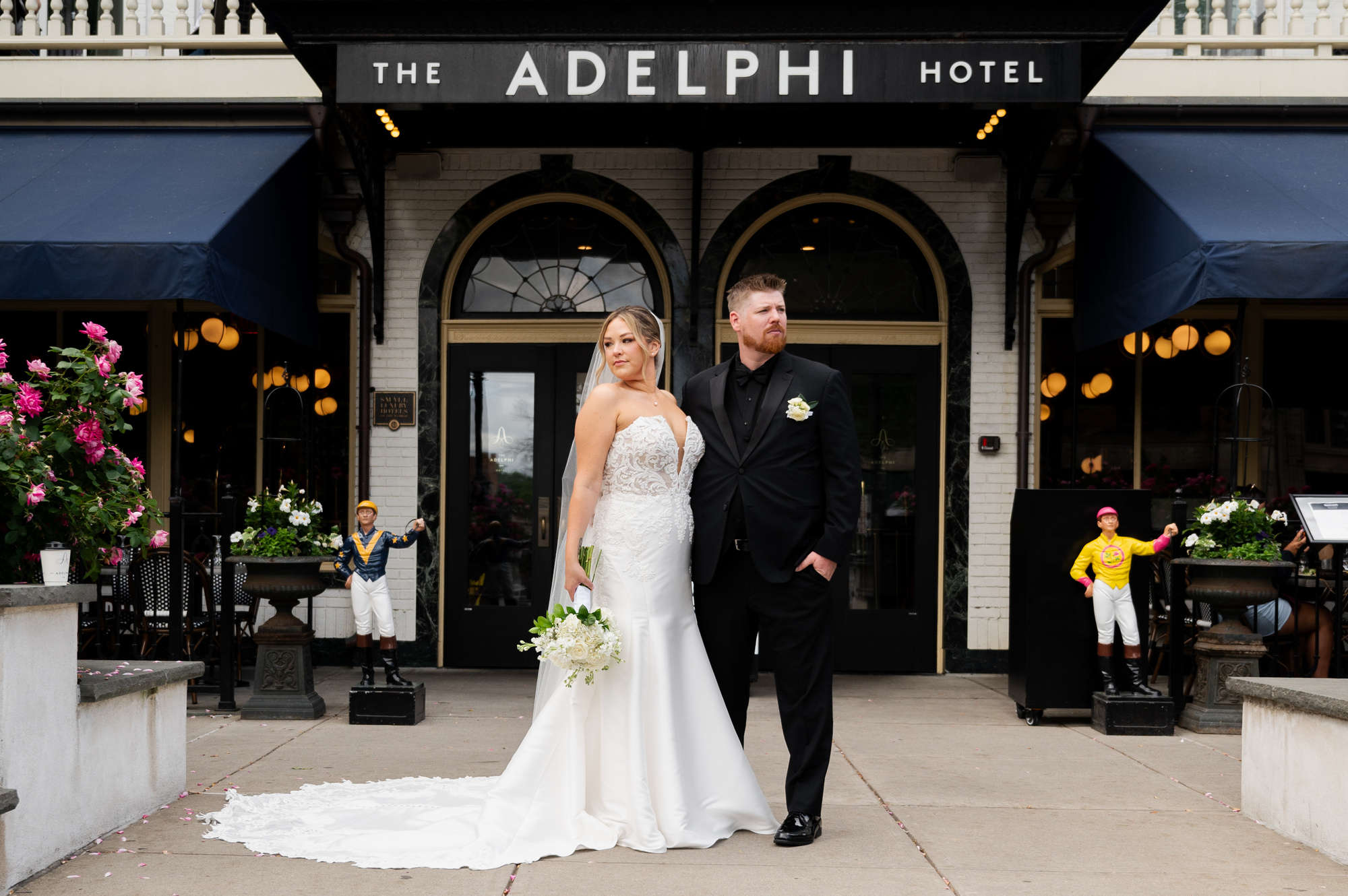 A wedding photo in front of The Adelphi Hotel in Saratoga Springs, New York.