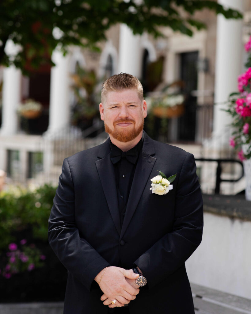 The groom eagerly awaiting the first look with his bride outside of The Adelphi Hotel in Saratoga Springs, NY.