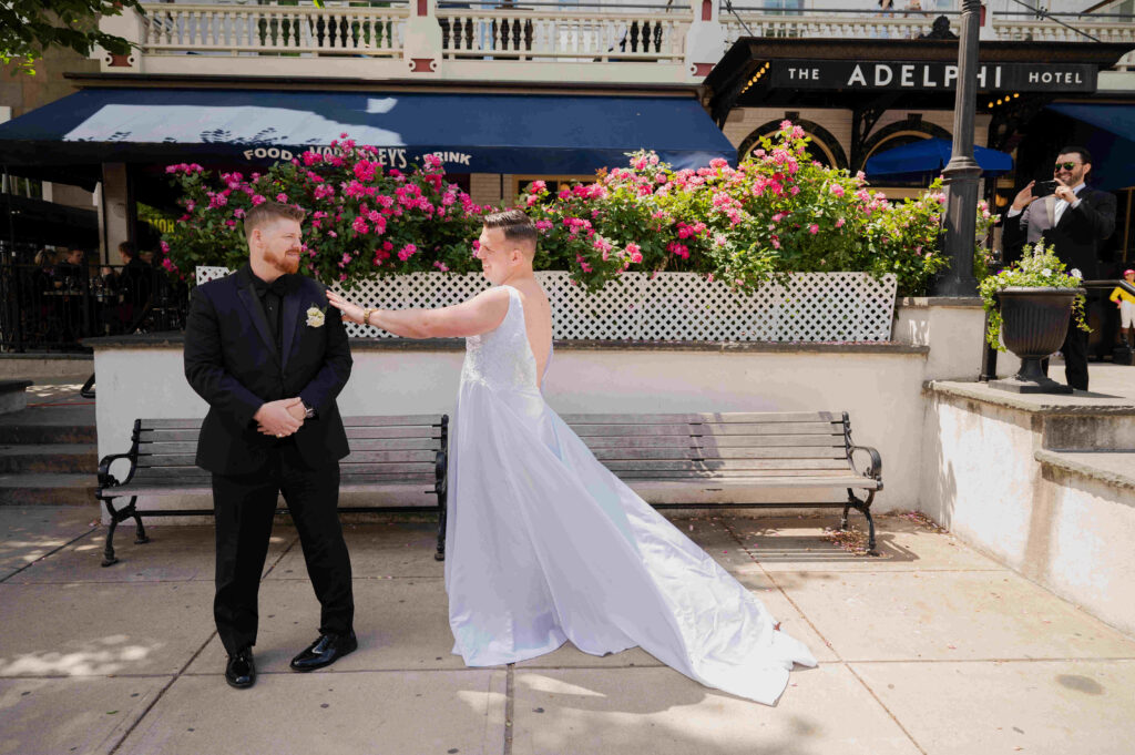 The first look at his Best Man in a wedding dress outside of The Adelphi Hotel.