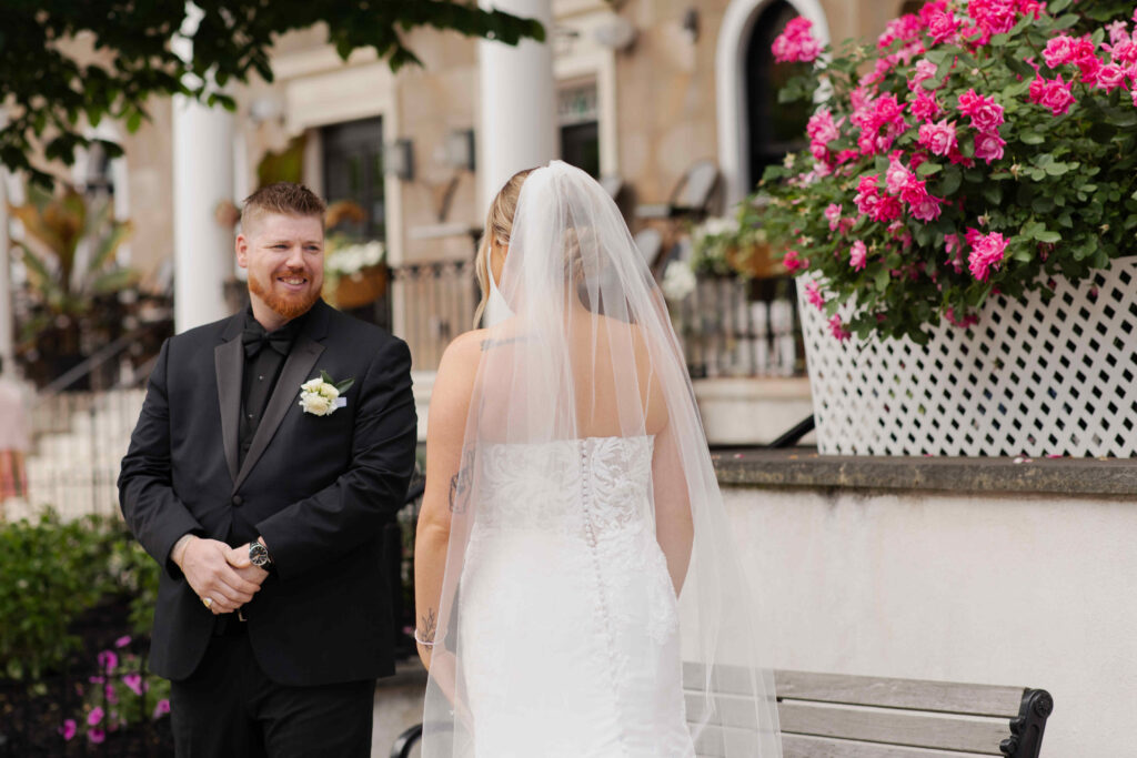 The first look at his bride in a wedding dress outside of The Adelphi Hotel.