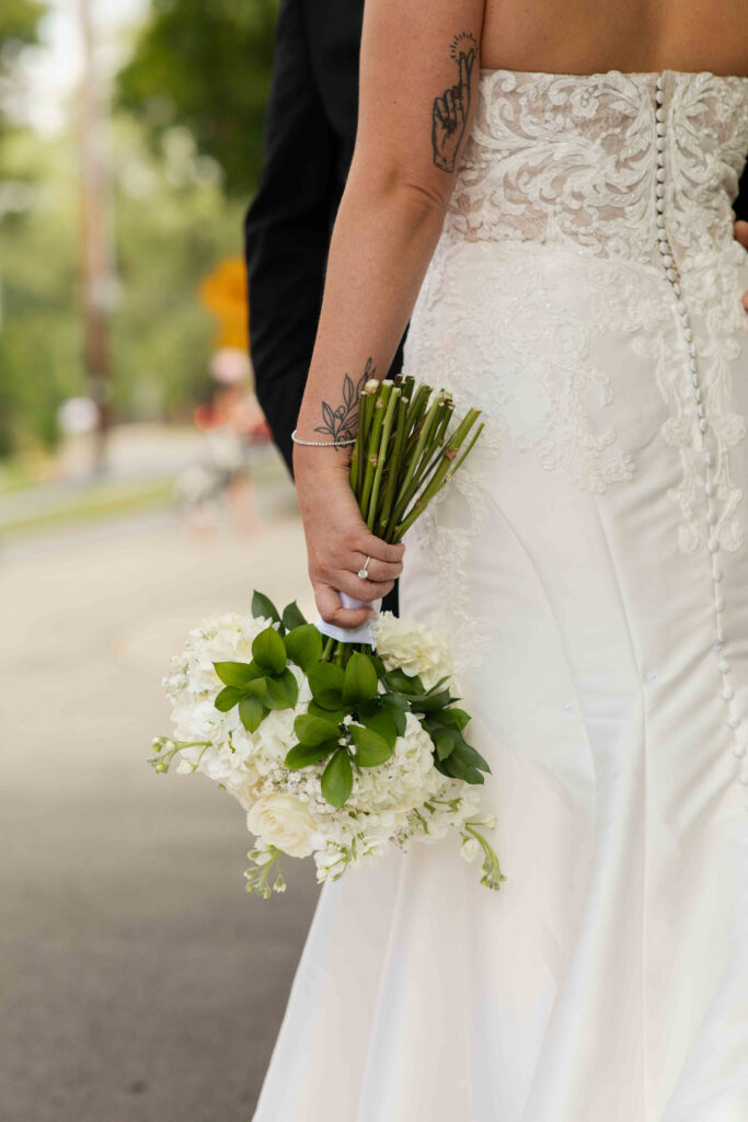 A candid of the bride's bouquet outside of Saratoga Race Course.