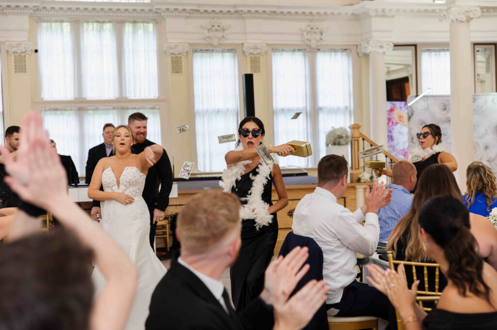 The bridal party making their entrance into the ballroom of the Canfield Casino during a wedding in Saratoga Springs, New York.