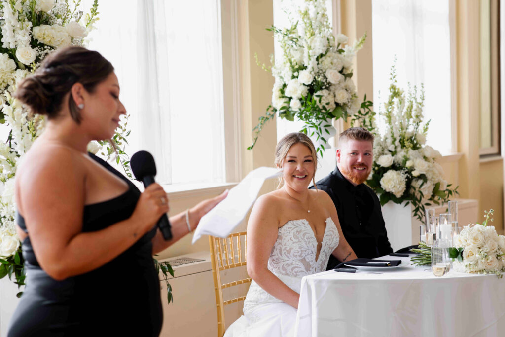 A candid during one of the bridal party speeches at a Canfield Casino wedding in Saratoga Springs, New York.