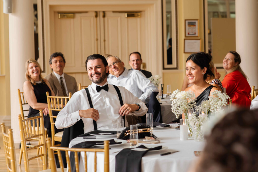 A candid during one of the bridal party speeches at a Canfield Casino wedding in Saratoga Springs, New York.