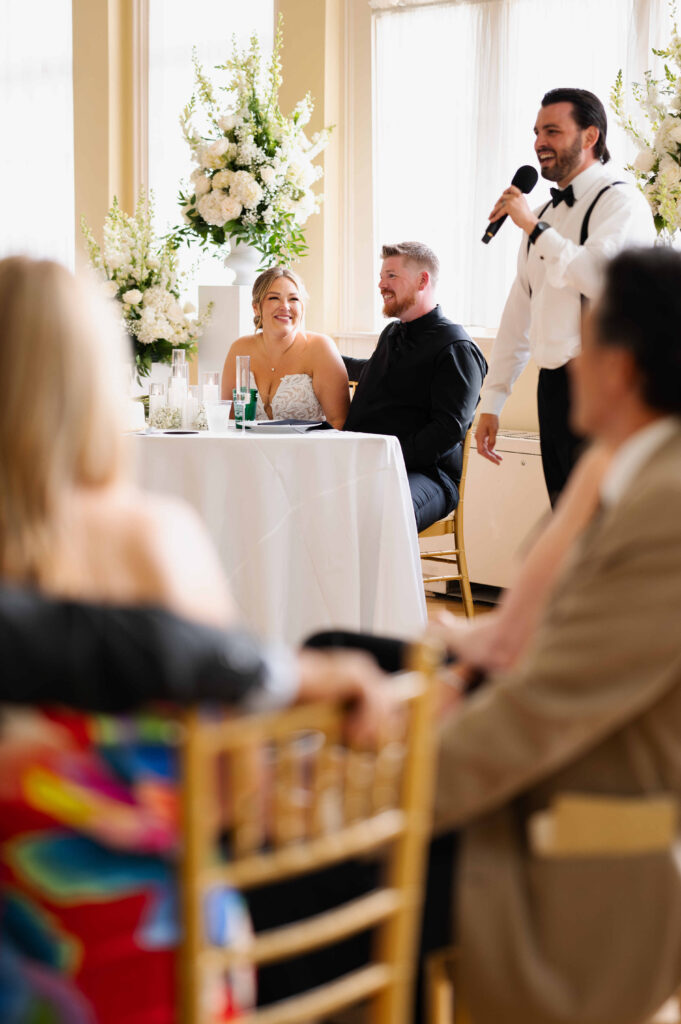 A candid during one of the bridal party speeches at a Canfield Casino wedding in Saratoga Springs, New York.