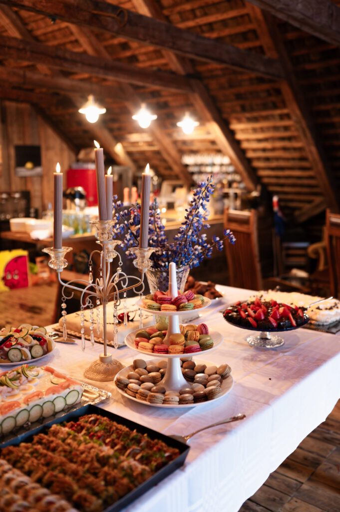 Icelandic delicacies and desserts on a reception table for a destination wedding reception at an Airbnb in Ísafjörður.